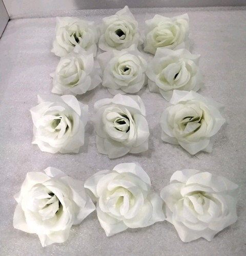 Ivory rose flower heads - x,