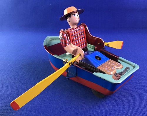 Vintage tinplate man boat - tinplate, a