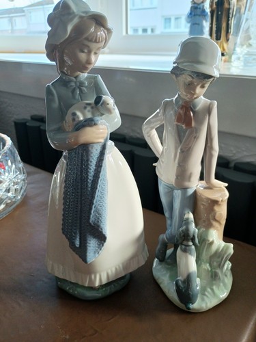 Two nao lladro ornaments - two,