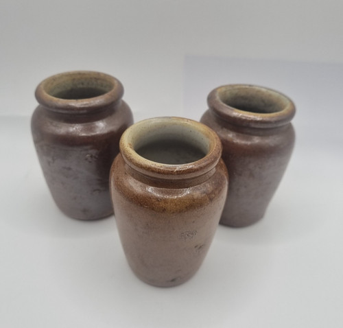 Three salt glazed cream pots - cream,