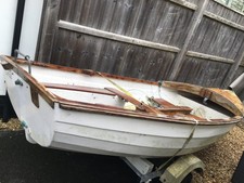 sailing dinghy with road