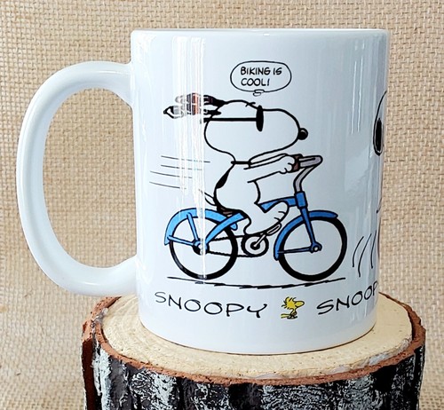 Snoopy cycling wheelies - cycling, mug