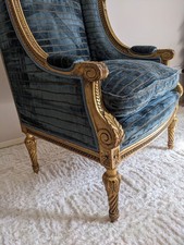 A French giltwood wingback