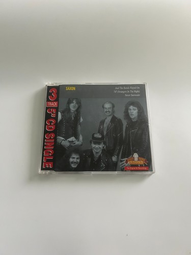 Saxon and the bands played - the,