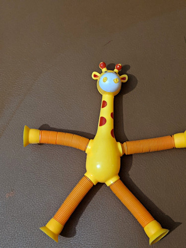 Giraffe pop tube - pop, sensory