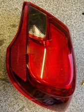 460034366  - Corsa rear light lens, complete, used.