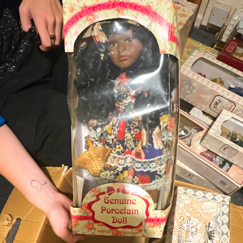 Porcelain girl doll dark - girl,