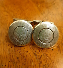 Silver round cufflinks as