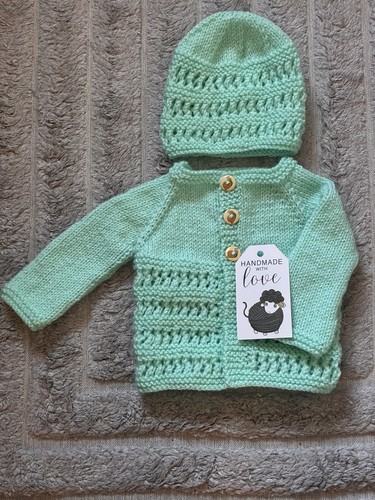 Hand knitted baby - hand,