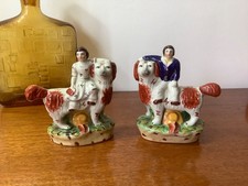 Pair Of Staffordshire Figures, Boy and Girl On Spaniels Wally Mantel Dogs