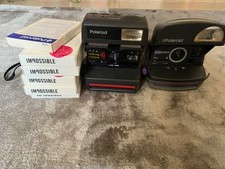 2x Polaroid cameras, 5x Impossible PX680 and a Polaroid 600 film. 
