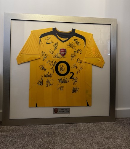 Signed framed arsenal - signed,