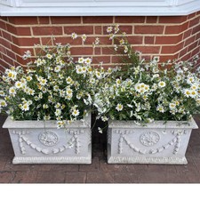 a pair of vintage style limestone Haddonstone adam box planters