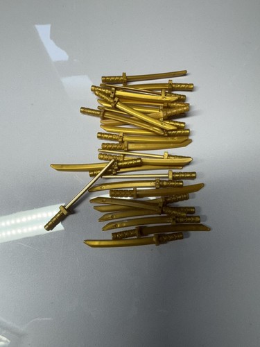 Lego parts x27 pearl gold - x27,