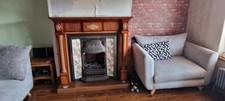 wood affect fire surround with cast iron insert