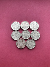 a collection of eight 2015 round pound coins all in good grades