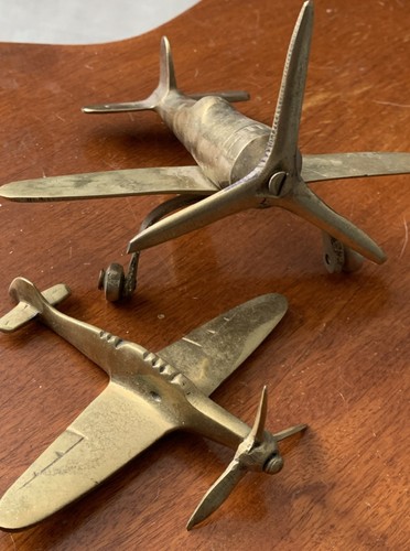 Two brass trench art fighter - two,