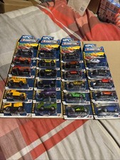 23 Carded Metal Vehicles From