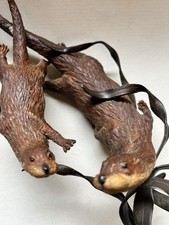 Two Hand Craft Sculpture Otters On Cast Iron As Plant Or Kelp Pre -Owned VGC