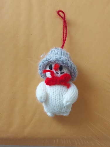 Hand knitted snowman - hand,