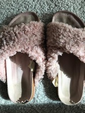 Worn used ladies pink fluffy