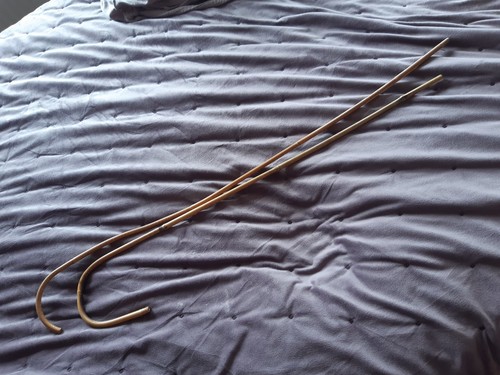 Two old bamboo canes - old,