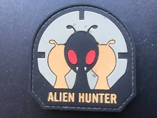 Alien Hunter Novelty Badge