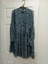 Ladies size 10. Unique Is the brand Name . Paid a fortune for this dress