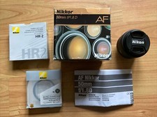 Nikon AF Nikkor 50mm f/1.8D Camera Prime Lens (Boxed) + HR-2 + Nikon NC Filter