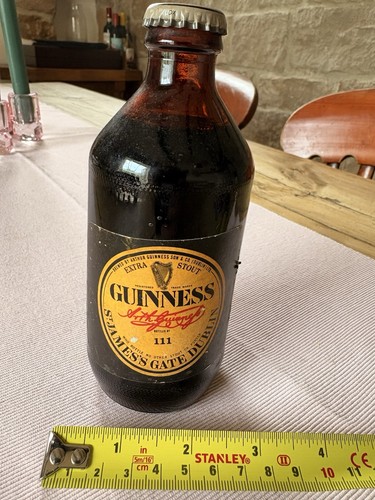 Vintage guinness bottle half - guinness,