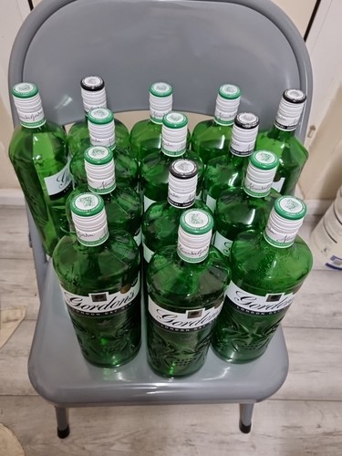 Empty gin bottles with - 13,