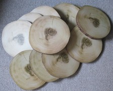 11 Wood effect log table centre pieces from the Range.