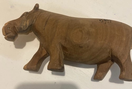 Wooden hand calved hippo - hand,