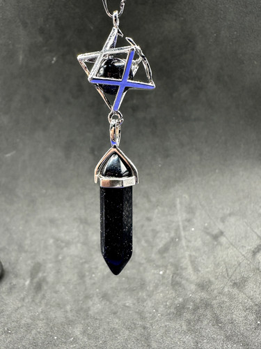 Crystal dowsing pendulum with - crystal,
