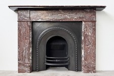 Antique Reclaimed Victorian Fireplace surround in Rouge Royal marble. Circa 1890