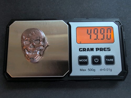 Hand poured copper skull - hand,