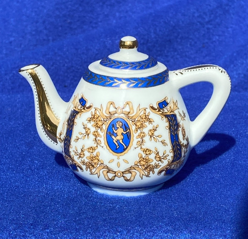 Porcelain art miniature teapot - porcelain,