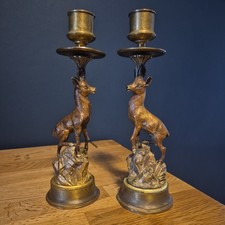 ANTIQUE PAIR OF BRONZE DEER CANDLESTICKS