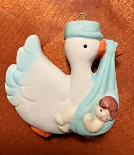 Porcelain stork with boy - with,