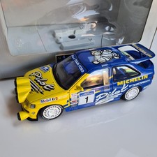 MINICHAMPS UT  1/18  FORD ESCORT RS COSWORTH MICHELIN PILOT BRC CHAMPION 1984