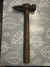 An antique coal hammer of