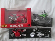4 OFF MAISTO   1-18 SCALE MOTORCYCLE MODELS