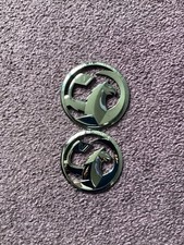 Two Vauxhall Hood Badges