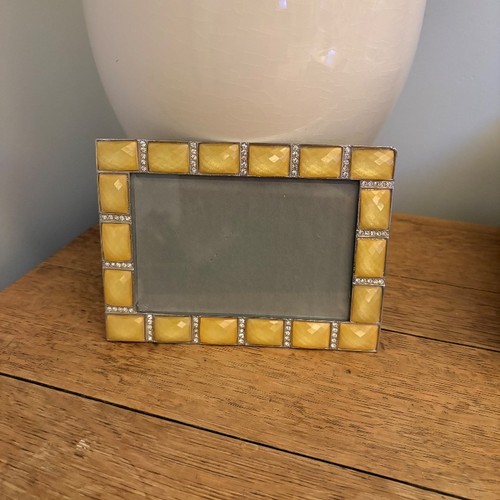 Yellow gemstone crystal - &,
