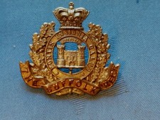 QVC.The Suffolk Regiment cap badge.