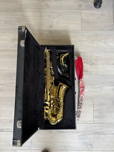 Saxophone with case - with,