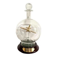 Ornamental glass model of a Spitfire aeroplane in a decorative glass decanter