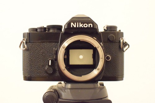 Black nikon 35mm film slr - black,