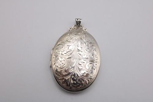 Large oval silver chased