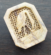 A HAND CARVED SOAPSTONE
